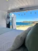 cama-con-ventilador-alquiler-de-camper-en-ibiza.webp