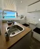 sala-de-estar-con-agua-caliente-y-ventilador-de-furgoneta-de-alquiler-en-can-camper-ibiza.webp