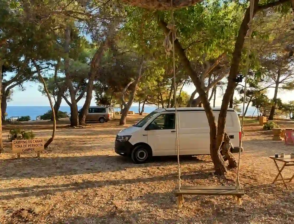 Shaded overnight areas at Camping Es Canar in Ibiza, perfect for camper vans
